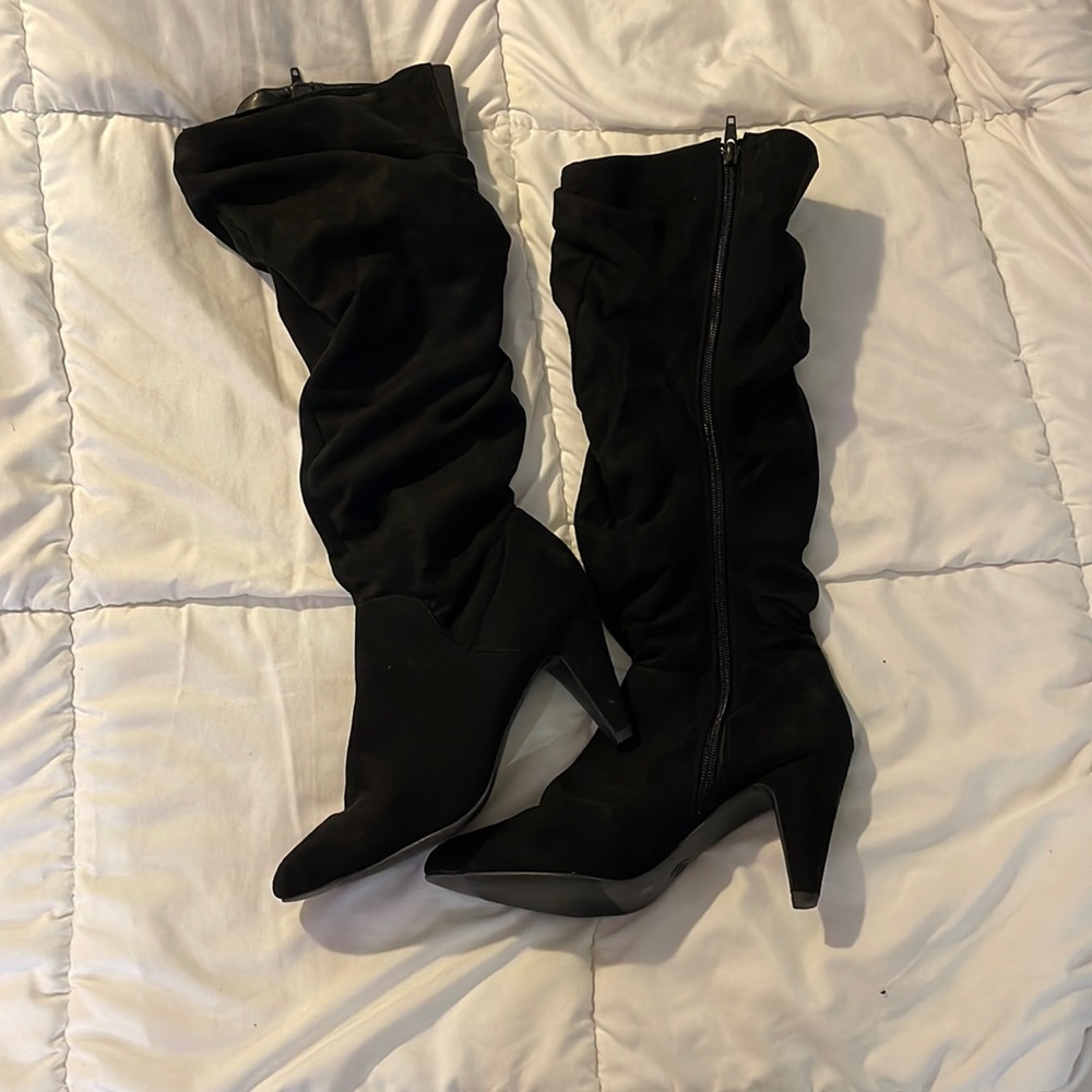 Knee high, memory foam heeled boots.